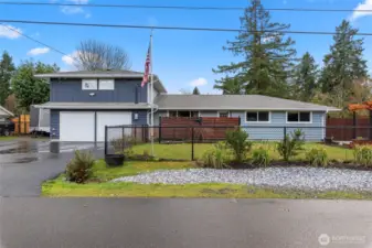 Completely asphalted front driveway area with parking for 5 plus vehicles.