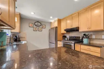 5 burner double oven gas stove with 30 amp breaker available behind the range.