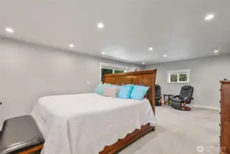 Oversized primary bedroom with sitting area.