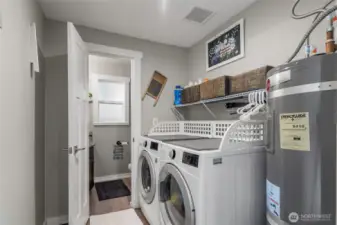 New Rheem Pro Series 50 gal hot water tank plus newer LG washer & dryer.