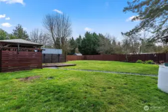 Back: Cedar privacy fencing.
