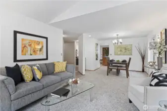 The dining room is between the kitchen & living room