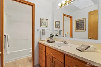 Guest full bath between the primary and bedroom 2