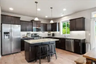 Kitchen has been customized - tile & granite countertops plus flooring