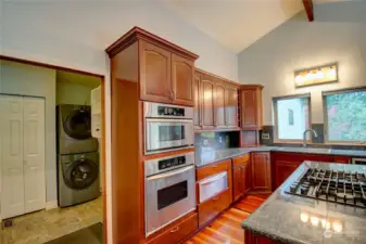 Gourmet Kitchen with high-end appliances and insta-hot sink.