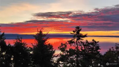 Amazing sunset views from this incredible home. Welcome to 971 Rockaway Lane on Camano Island.