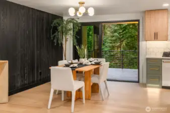 Dining space off kitchen and living with room for 8+