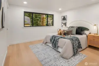Spacious main bedroom with en-suite and custom closet