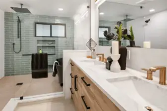 Primary en-suite bathroom fit for a spa: fully tiled wet room, soaking tub, custom lighting and cabinetry, water closet, triple shower heads, and dual vanity