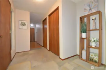 Entryway and Hallway Leading to the Bedrooms and Kitchen