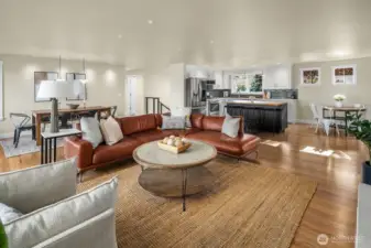 This beautifully remodeled home has gorgeous wood floors, fresh paint, updated kitchen and top of the line designer and LED lighting.