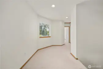 Upstairs, find a impressive primary and two additional spacious bedrooms.