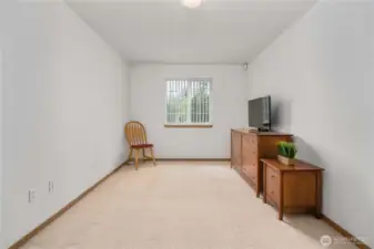 Spacious bedroom no. 2 located upstairs.