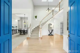 Soaring entry, offering a traditional layout with both formal and informal spaces