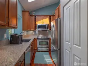 Full kitchen with washer / dryer closet.