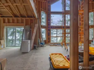 The great room with dining room at left.