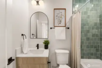 Sleek finishes, a deep soaking tub, and neutral tones create a spa-like retreat where you can soak the day's stress away.