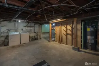Large partially finished basement w/laundry