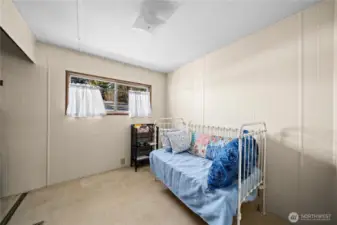 Additional bedroom providing flexible space for visitors, crafts, or quiet relaxation.