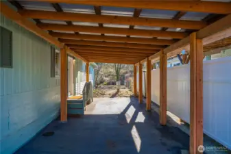 Deep 2-car covered parking providing protection from the elements and added convenience.