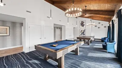 Recreation space featuring billiards/ping pong and comfortable seating for games and social time.