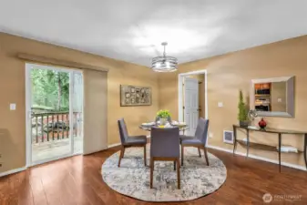 Deck left, then laundry and garage right-center