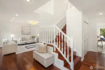 Spacious entry way with gleaming Brazilian Cherry hardwood floors throughout most of the home