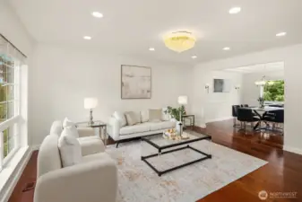 Light and bright living room, large picture window fill the home with natural light.