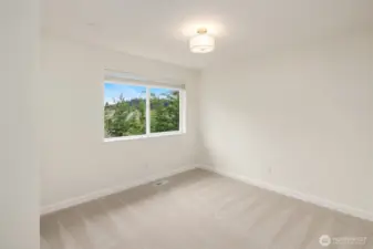 There are two secondary bedrooms on the upper floor. New carpets throughout all the bedrooms