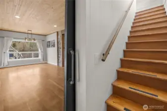 View from the primary suite barndoor headed upstairs