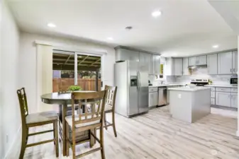 The dining space and remodeled kitchen make the heart of this home the best place to be! An oversized sliding door will lead you to the covered patio and backyard adding to your entertaining options.