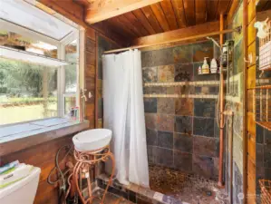 3/4 Bathroom with slate shower and garden window.