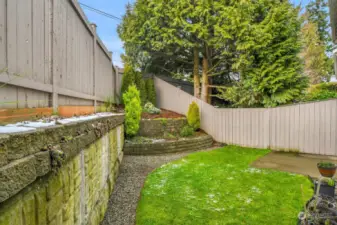 Fully fenced backyard with space for a BBQ and outdoor gatherings!