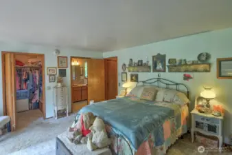 Primary Bedroom features walk-in closet and attached bath