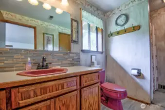 Primary bathroom has hallway access