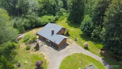 Looping driveway with ample parking