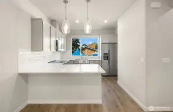 Picture is of a similar home in the community.