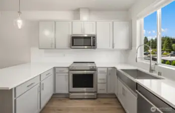 Picture is of a similar home in the community.