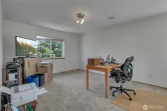 Could be office or art room it looks down on formal living room