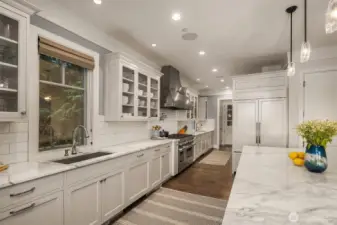 This dreamy kitchen was designed by a serious entertainer /chef and it shows!  The flow and professional appliances is ideal and so great for dinner for 2 or 20!