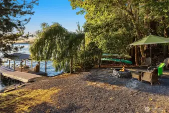 Enjoy this sweet beach and easy water access for kayaking, paddleboarding, swimming and evening bonfires.