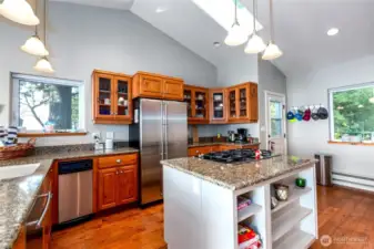 Spacious kitchen centered around a large island.