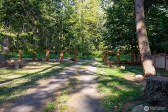 Fully fenced property with a dog run.