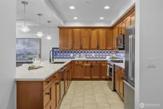 Enjoy generous prep space and sleek storage solutions in this modern kitchen