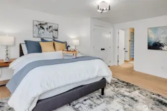 Primary Bedroom Retreat: Unwind in your serene owner’s suite featuring soft tones, plush textures, and peaceful garden views.