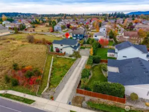 Big driveway, home is surrounded on 3 sides by State, City, and Neighborhood Green Space!