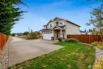 Level lot w/3 car garage, tons of parking & space...