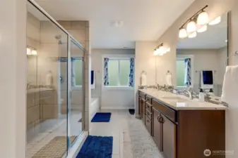 Dual vanity, soaking tub, shower & ceramic tile!