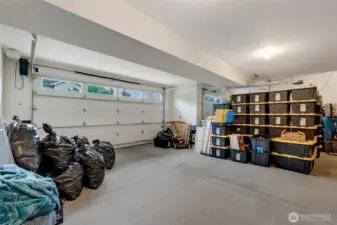 Oversized finished LEVEL Entry 3-car garage + Tankless water heater.