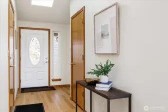 Lovely entry-way. Garage entrance to left and coat closet to right.